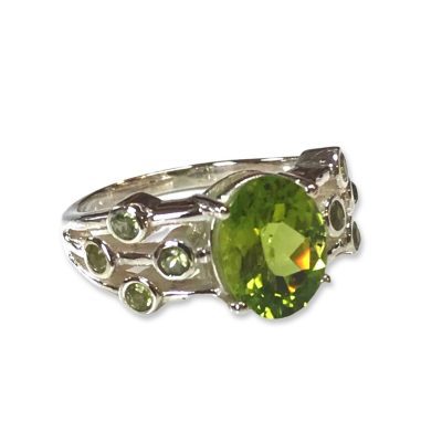 Peridot faceted oval solitaire with accent gems ring Size L & N
